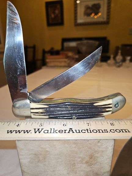 Two(2) large folding knives...