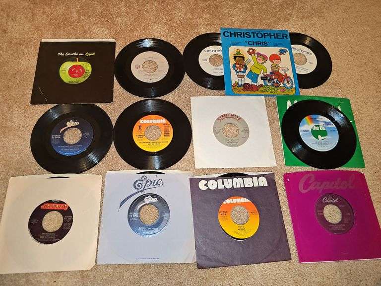 Grouping of 45's records. "Christopher" is a vintage Captain Kangaroo version. See all photos for various titles.