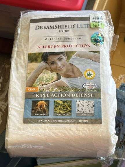 31 gallon tote and contents…..NEW King Size mattress protector, SubZero bottles, NEW kitchen gadgets and much more (no lid for tote)