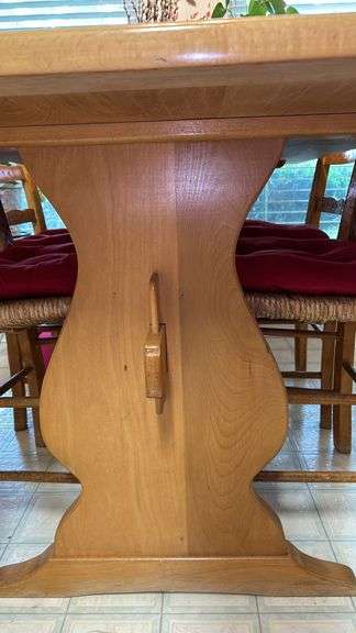 Exquisite custom built table and chairs……custom built in 1972 in Nicosia, Cyprus from oak(?). There are no nails except on the chairs to hold the rush seating in place. Chairs are hand carved…..one small blemish on table top