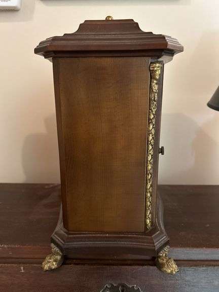 Vintage Franz Hermle & Sons Germany mantel clock with key and brass feet…..working condition….5820/4 on back….340-020 on workings….10-1/2 x 6-1/2 x 11 tall