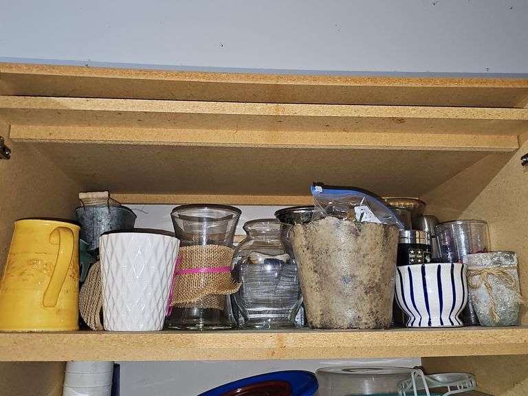 Cabinet contents as shown. Cabinet not included.