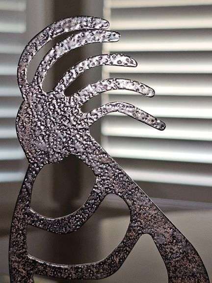Kokopelli book end. 7 in tall