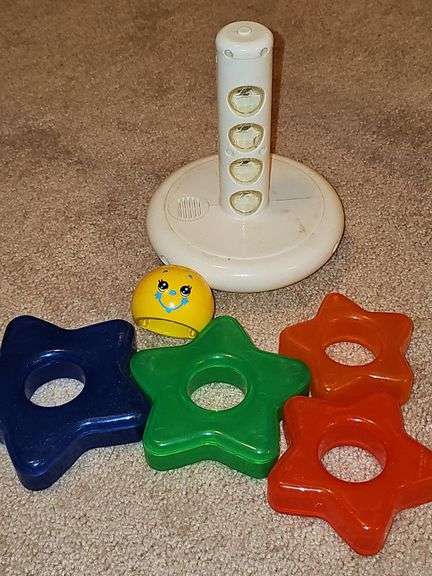 Vintage Fisher-Price toys. Snoopy and teaching clock in working order. Sparkling symphony star sticker needs batteries.