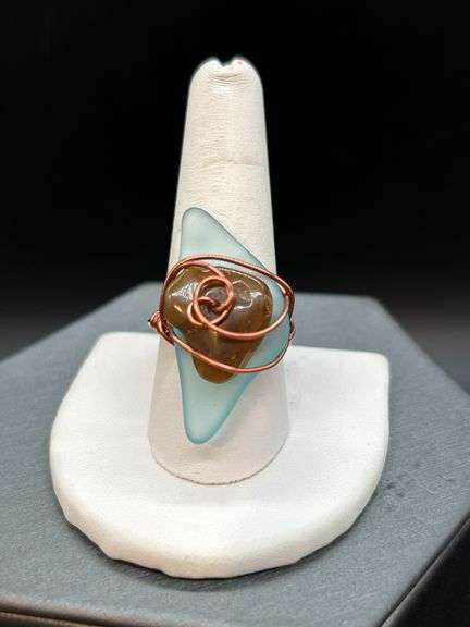 Uniquely designed copper wire ring with blue & brown stone…..size 10