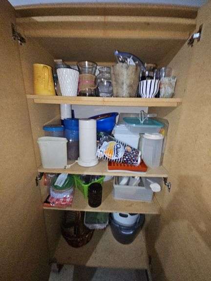 Cabinet contents as shown. Cabinet not included.