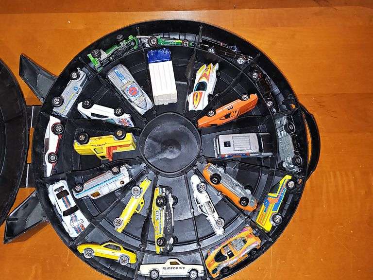 Vintage Hot wheel carrying case and cars as shown. One redline wheel in this grouping. Dukes of Hazzard car is Ertl.