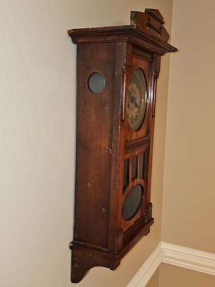 Antique pendulum clock. Chimes on half hour and counts whole hours. Did not locate a maker. Was operating properly at time of listing. 11x7.5 x 30 in tall.