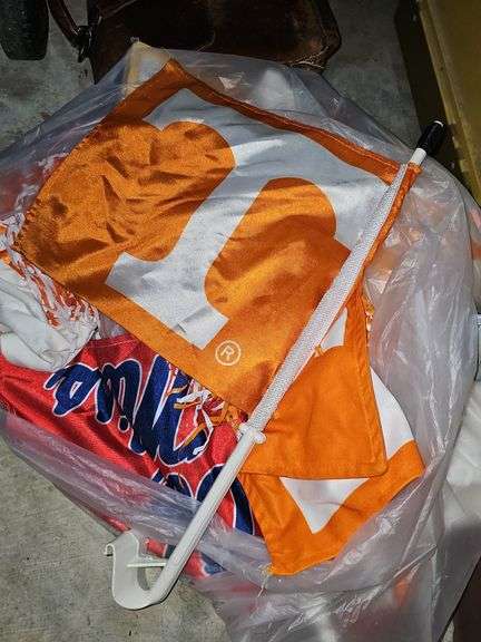 Car flags and pom poms for Ole Miss and UT Vols.