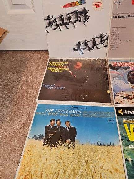 Grouping of albums by Chase, Howard Roberts quartet, camarata and his orchestra, cannonball Adderley quartet, the Letterman, and victory at Sea.