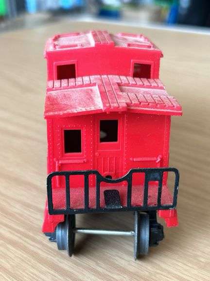 Lionel Trains Red Plastic Caboose…..needs cleaned from being stored in attic