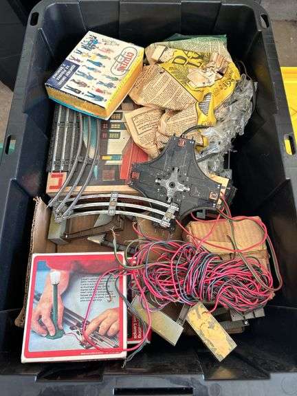 27 gallon tote full of Lionel train pieces and parts