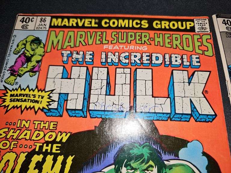 Two comic books. The incredible hulk and Black panther. See all photos for more information