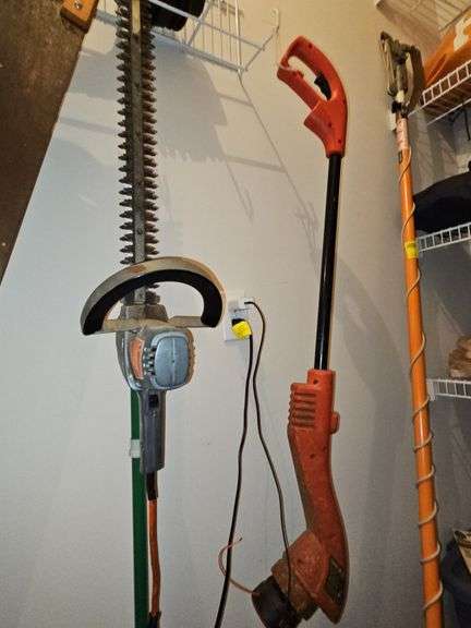 Black & Decker electric 22-in hedge trimmer and black and Decker electric weed eater