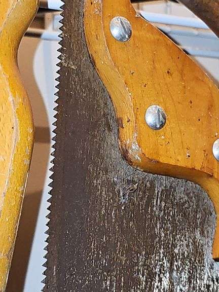 Three vintage hand saws