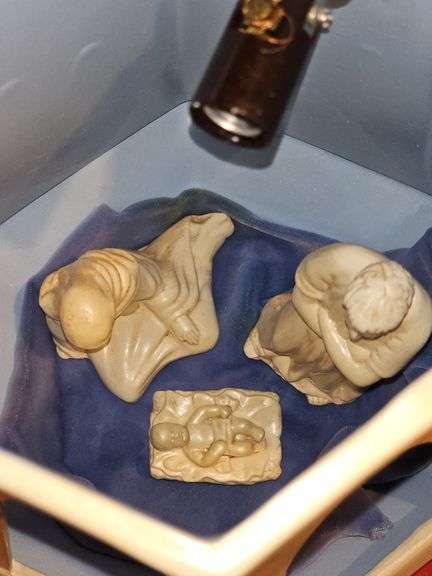 Handcrafted lighted nativity set. Untested.. approximately 14 in tall.