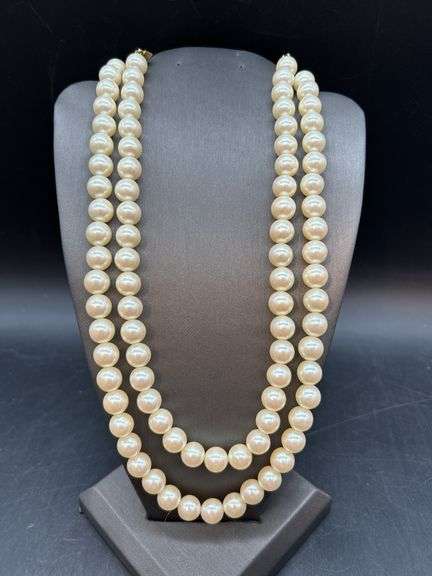 Nice looking double strand of pearl-like beads with adjustable fastener