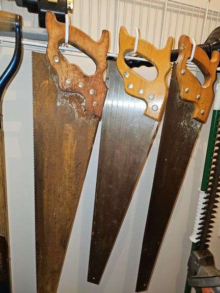Three vintage hand saws