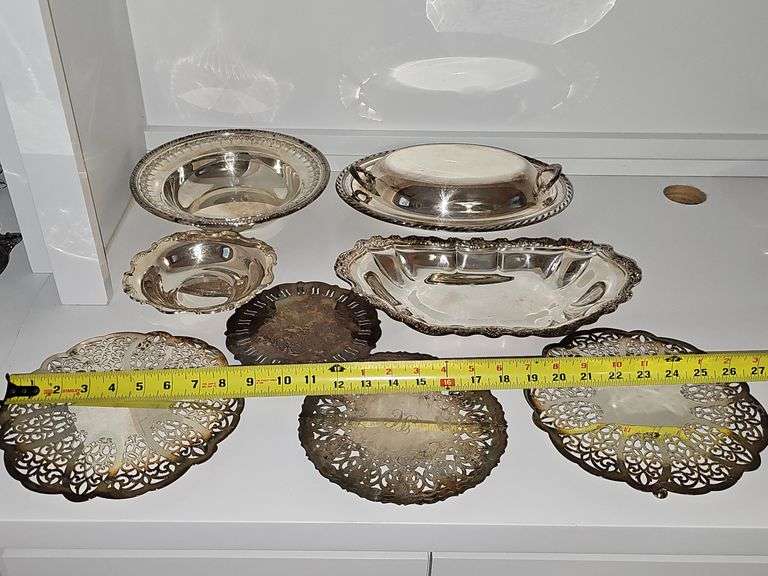 Silver plate bowls, covered dish, and trivets.