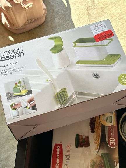 27 gallon tote and contents…..kitchen gadgets, NIB kitchen sink set, NIB 30-piece Rubbermaid food storage set and much more
