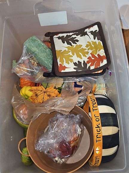 Two tubs of fall decor.