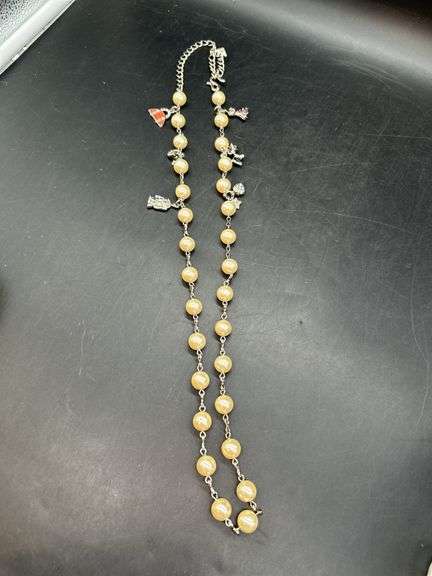 Adjustable waist size iridescent pearl-like beaded belt with charms