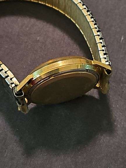 Men's Bulova watch with 14 karat gold case. Watch is not working.
