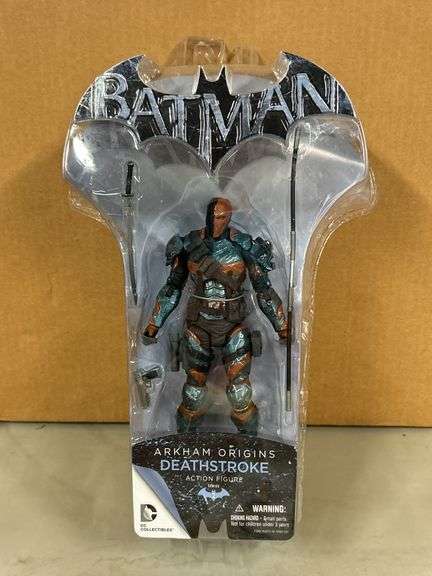 NEW Batman Arkham Origins “DEATHSTROKE” action figure…..item is new but blister pack is torn at top (see pics)