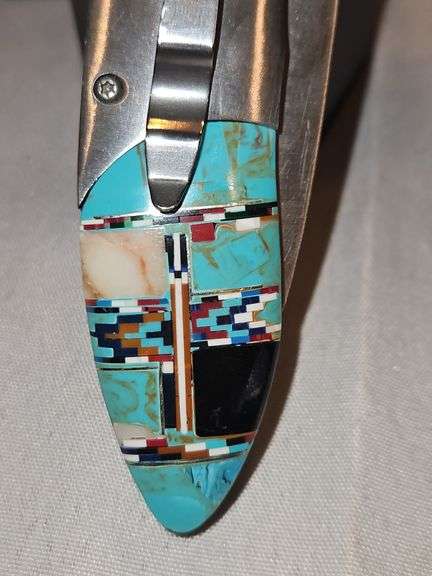 Two(2) large folding knives...