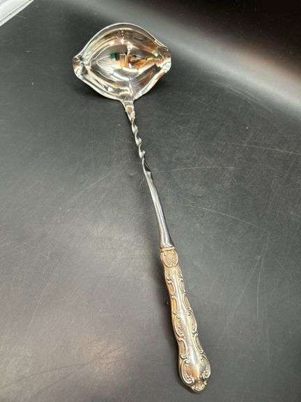 Very nice Buttercup by Gorham  sterling handled ladle with twisted neck