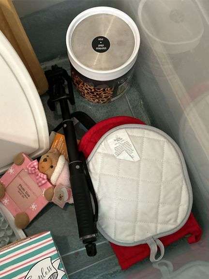 Tote full of miscellaneous household/kitchen items…..Food Network stemware, partial box of Rubbermaid storage containers, cutting boards and more