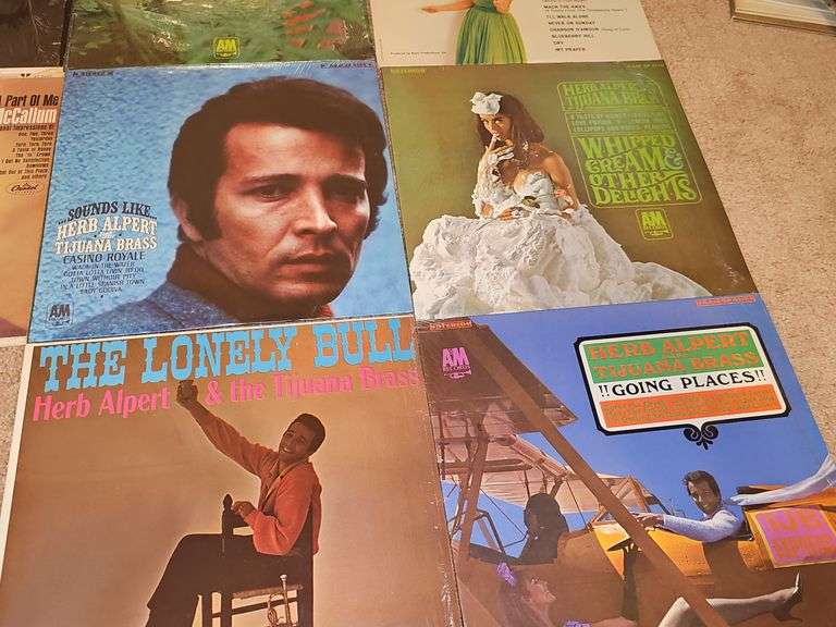 Grouping of albums by David McCallum Ray Conniff, Sergio Mendes, Herb Albert and the Tijuana brass.