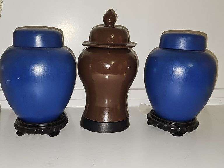Three ceramic urns. 9.25 in and 11.25 in tall.