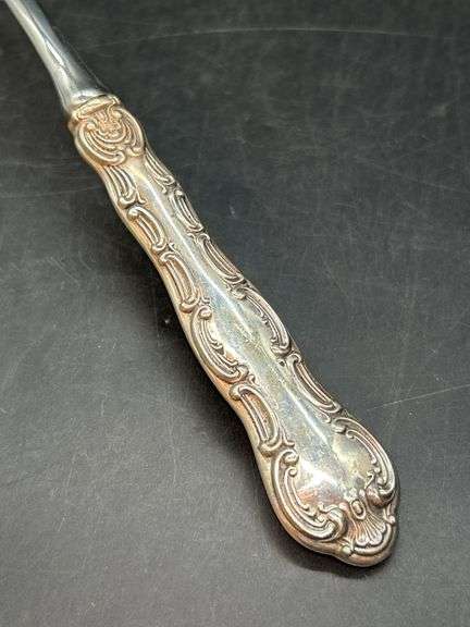 Very nice Buttercup by Gorham  sterling handled ladle with twisted neck