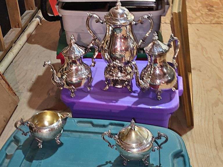 Tub of silver plate items. Two teapots, heated coffee pot, covered sugar, and creamer.