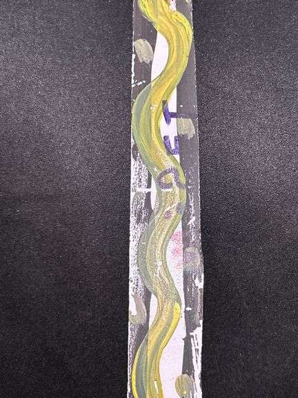 Original signed Mose T long skinny neon green snake Folk Art with signature soda can tab hanger…..1-3/8 x 21-1/2