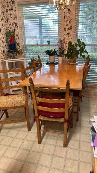 Exquisite custom built table and chairs……custom built in 1972 in Nicosia, Cyprus from oak(?). There are no nails except on the chairs to hold the rush seating in place. Chairs are hand carved…..one small blemish on table top