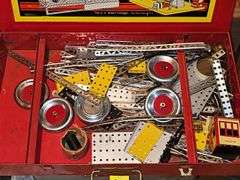 Erector set in metal chest. Cannot verify if all pieces are there or not.