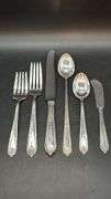 Sterling 6-piece place setting of Della Robbia by Alvin…..includes salad fork, dinner fork, knife, teaspoon, tablespoon and spreader…..165 grams not including knife
