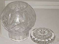 Beautiful Crystal candle holder. Can use tapers or pillars. Total of 7.75 in tall (two pieces).