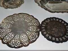 Silver plate bowls, covered dish, and trivets.