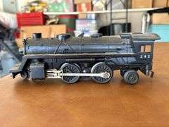 Selection of (2) Lionel Train pieces…..242 Steam Engine (with damage) and Lehigh Valley (L.V. 25000) red rail car