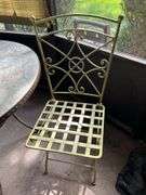 Vintage wrought iron slate top patio table with 2 wrought iron folding chairs with basketweave design seating……36”D x 30” tall…..15-1/2 x 15 x 17-1/2 to seat (36-1/4 tall overall)…..set is heavy