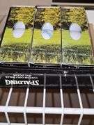 Grouping of golf balls. All boxes are full. Spalding, Titleist, and briarcrest saints.