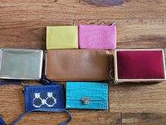 Ladies wallets and two trinket boxes
