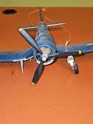 Model of a Vought F4U Corsair American fighter aircraft. (Missing right front wheel) Stuka-Junkers Ju 87, German dive bomber plane.