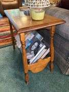 Vintage side table with bottom magazine rack…..26 x 13 x 23 tall