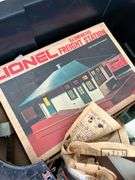 27 gallon tote full of Lionel train pieces and parts