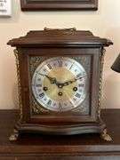 Vintage Franz Hermle & Sons Germany mantel clock with key and brass feet…..working condition….5820/4 on back….340-020 on workings….10-1/2 x 6-1/2 x 11 tall