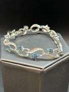 Beautiful vintage silver tone bracelet with sparkling iridescent stones…..7” long…..matching choker is lot 99
